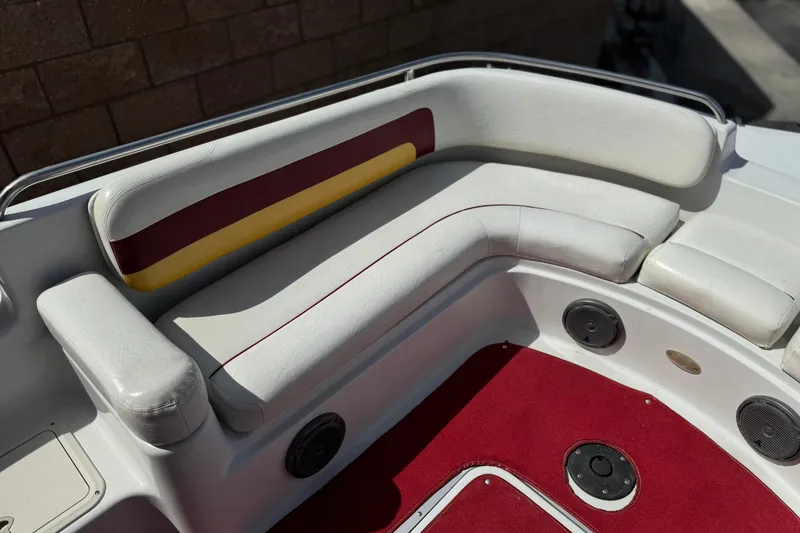 Slide: The Image of Red and white seating area on 2000 Godfrey 248 Fundeck boat. - 14