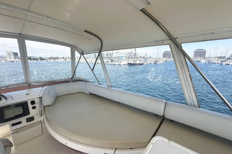 Slide: The Image of Interior view of 2007 Azimut 43 yacht with marina backdrop. - 13