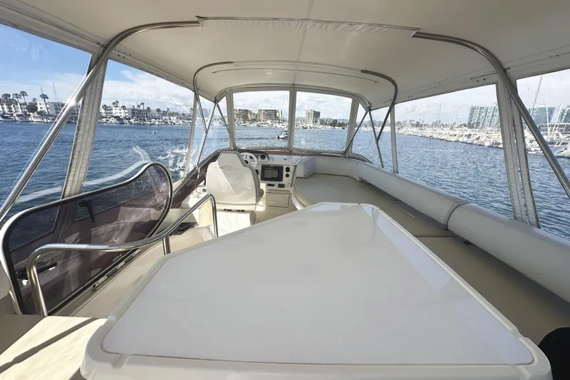 Slide: The Image of Interior view of 2007 Azimut 43 yacht with marina backdrop. - 14