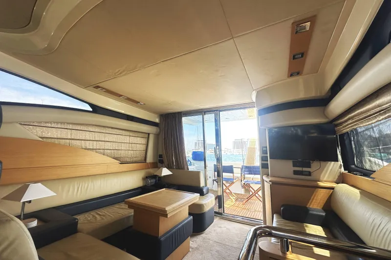 Slide: The Image of Luxurious interior of a 2007 Azimut 43 yacht with elegant seating and modern amenities. - 18