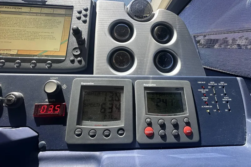 Slide: The Image of Control panel of a 2007 Azimut 43 yacht with navigation instruments. - 26
