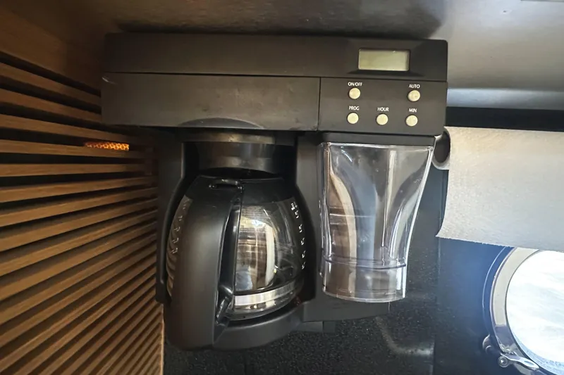 Slide: The Image of Built-in coffee maker on a 2007 Azimut 43 yacht, featuring programmable settings. - 32