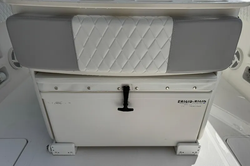 Slide: The Image of Cushioned seat and cooler on 2014 Blackwater 36 Sportfish boat. - 15