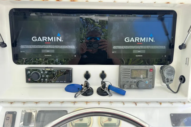 Slide: The Image of Control panel of a 2014 Blackwater 36 Sportfish with Garmin displays and marine electronics. - 22