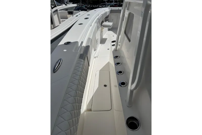 Slide: The Image of 2014 Blackwater 36 Sportfish boat deck with rod holders and seating. - 24