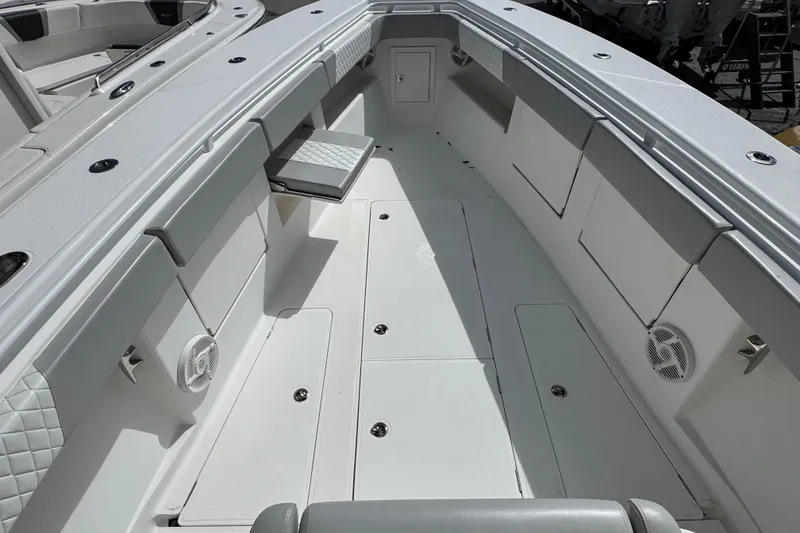 Slide: The Image of 2014 Blackwater 36 Sportfish boat interior with seating and storage compartments. - 27