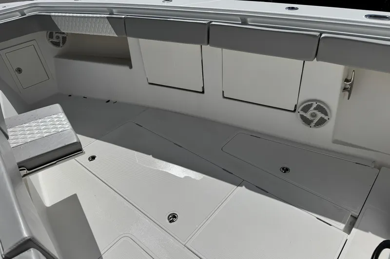 Slide: The Image of Interior of 2014 Blackwater 36 Sportfish boat, featuring seating and storage compartments. - 28