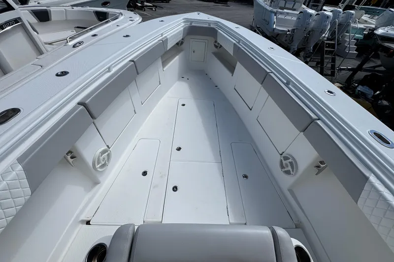 Slide: The Image of 2014 Blackwater 36 Sportfish boat interior with spacious seating and storage compartments. - 31