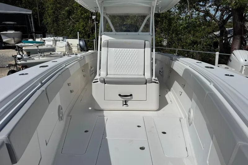 Slide: The Image of 2014 Blackwater 36 Sportfish boat interior with seating and storage compartments. - 35