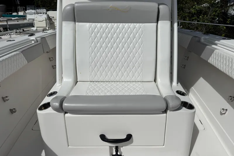 Slide: The Image of Luxury seating on 2014 Blackwater 36 Sportfish boat with cup holders. - 36