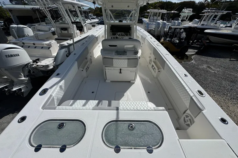 Slide: The Image of 2014 Blackwater 36 Sportfish boat interior with seating and storage compartments. - 6