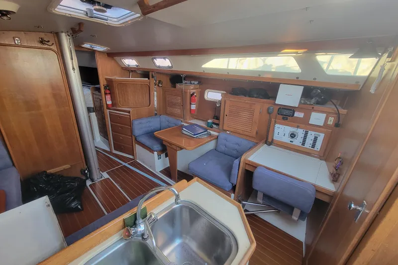 Slide: The Image of Interior of 1996 Catalina 36 MkII sailboat with wood finish and navigation station. - 20