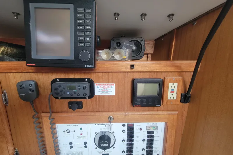 Slide: The Image of Control panel of a 1996 Catalina 36 MkII sailboat with radar and GPS systems. - 21