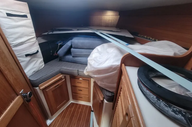Slide: The Image of Cozy cabin interior of a 1996 Catalina 36 MkII sailboat with wooden cabinetry. - 22