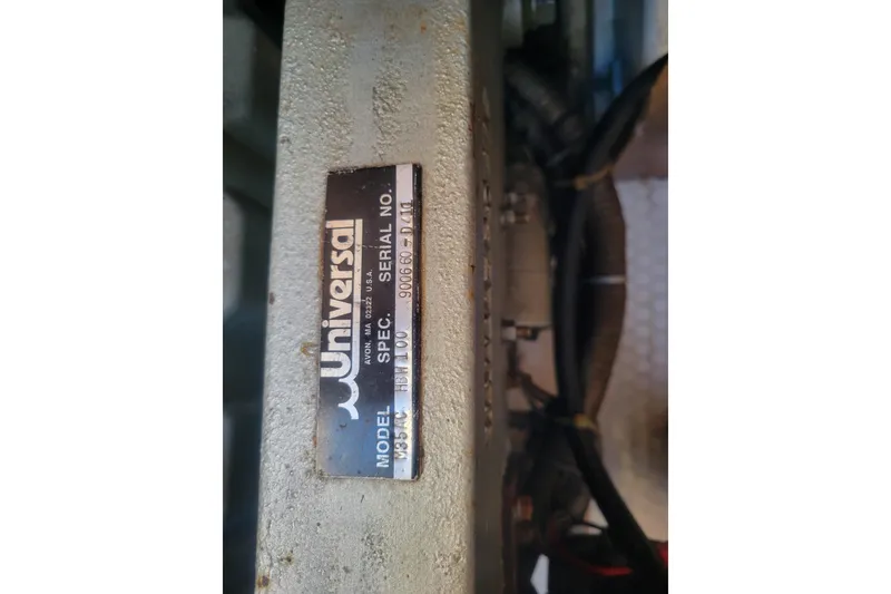 Slide: The Image of Engine label of a 1996 Catalina 36 MkII sailboat, featuring Universal model M35BC. - 29