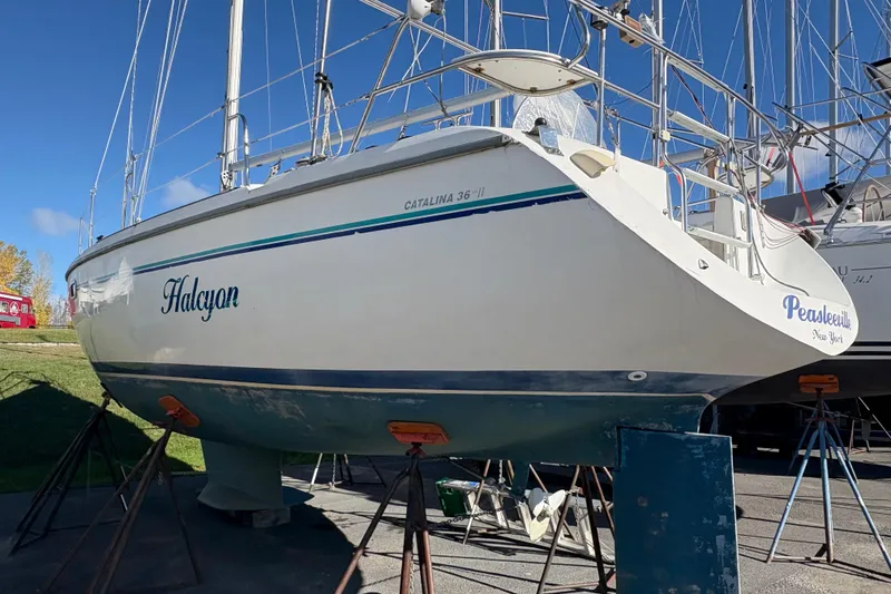 Slide: The Image of 1996 Catalina 36 MkII sailboat named "Halcyon" on stands, clear sky background. - 4