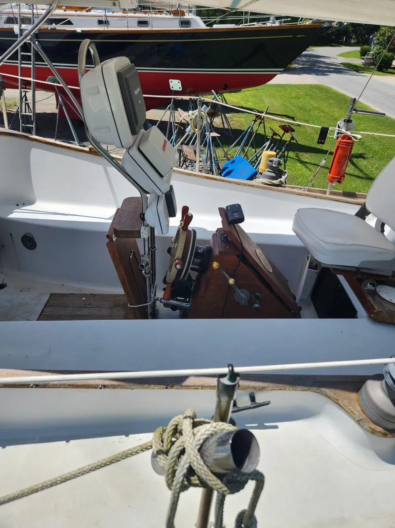 Slide: The Image of Cockpit of a 1964 Columbia 33 sailboat with navigation equipment. - 10