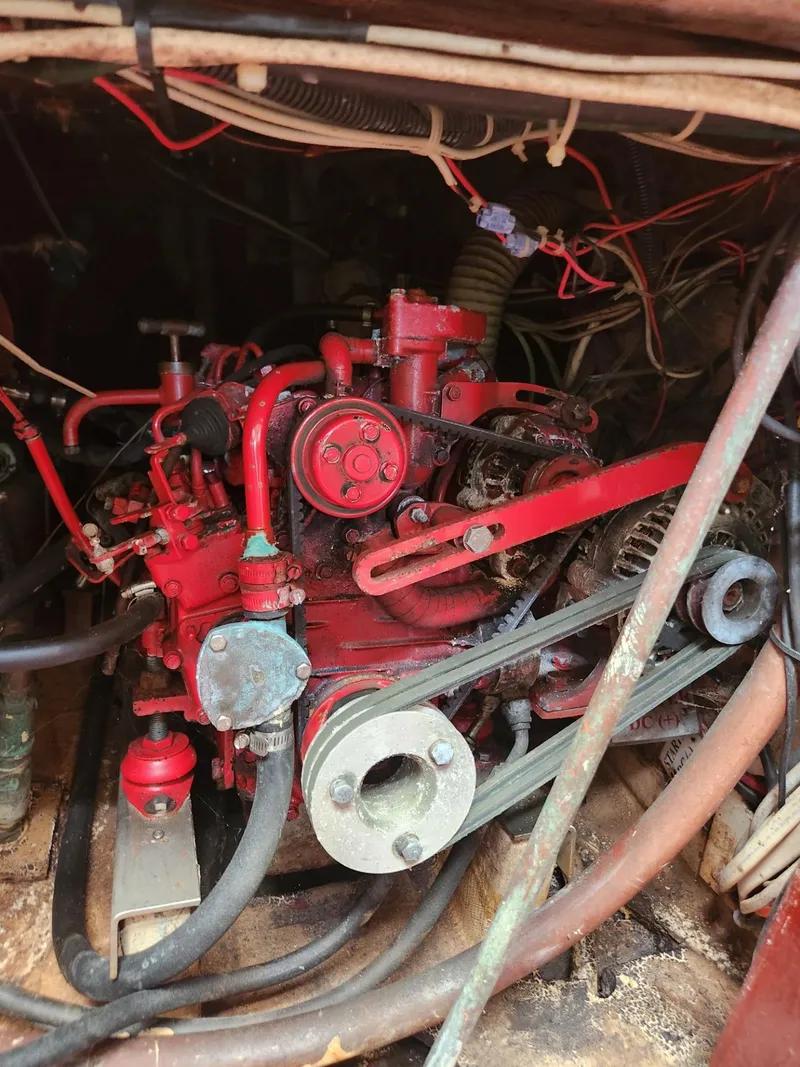 Slide: The Image of 1964 Columbia 33 engine with red components and wiring - 18