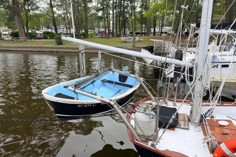 Slide: The Image of 1964 Columbia 33 sailboat docked at marina. - 20