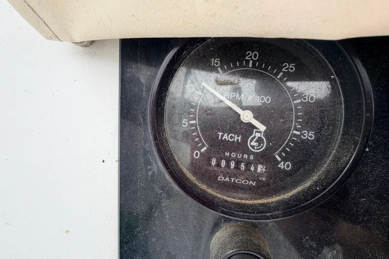 Slide: The Image of Tachometer of a 1964 Columbia 33 showing 954 hours. - 21