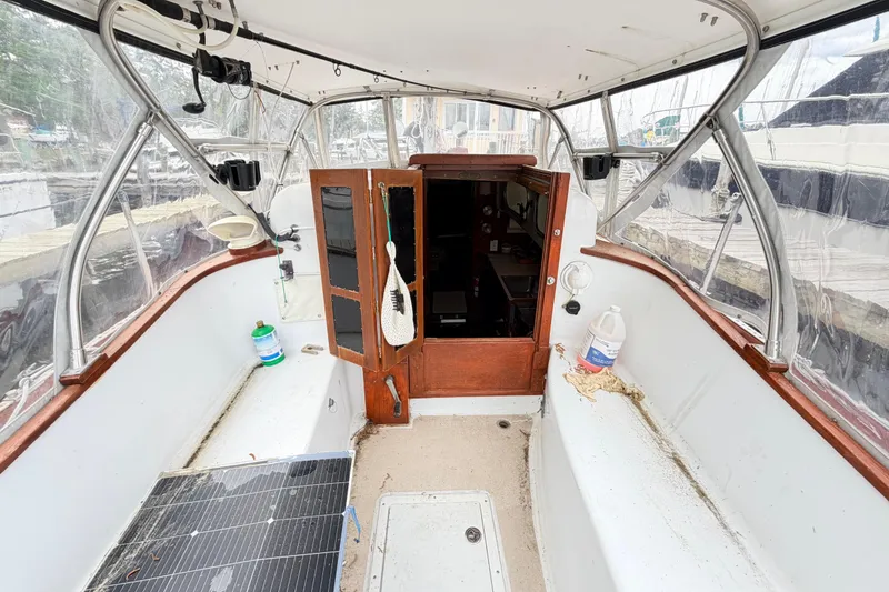 Slide: The Image of Interior view of a 1964 Columbia 33 sailboat cockpit. - 24