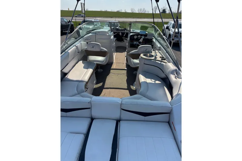 Slide: The Image of 2008 Four Winns H260 RS boat interior with spacious seating and modern design. - 6