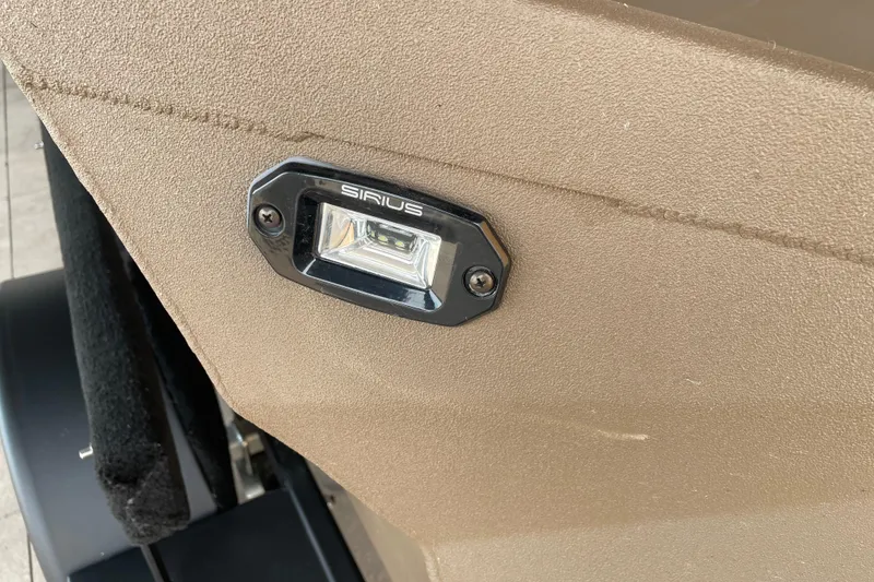 Slide: The Image of Close-up of Sirius light on 2026 Reaper 653 Timber Reaper vehicle. - 5