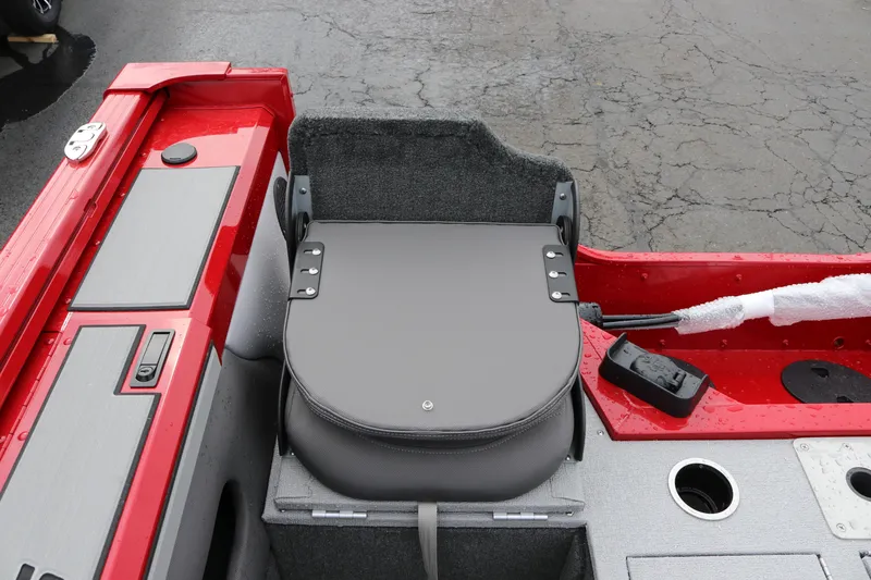 Slide: The Image of 2026 Smoker Craft Ultima 182 boat interior with red accents and seating. - 10