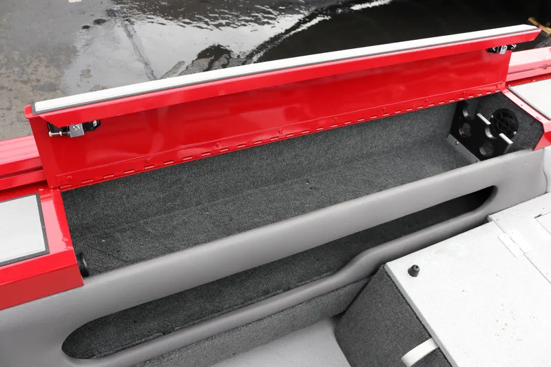 Slide: The Image of Interior view of 2026 Smoker Craft Ultima 182 boat with red and gray detailing. - 17