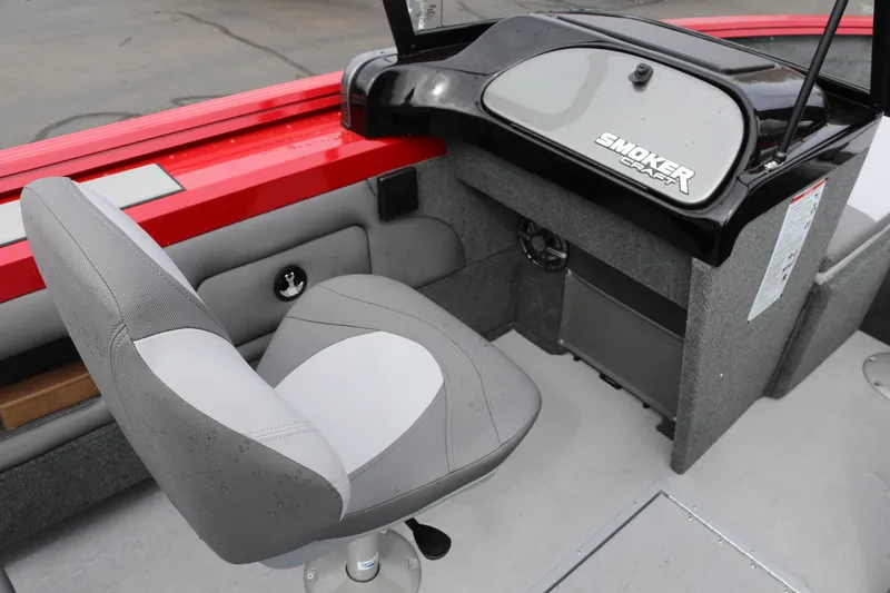 Slide: The Image of Interior of 2026 Smoker Craft Ultima 182 boat with gray seating and dashboard. - 18