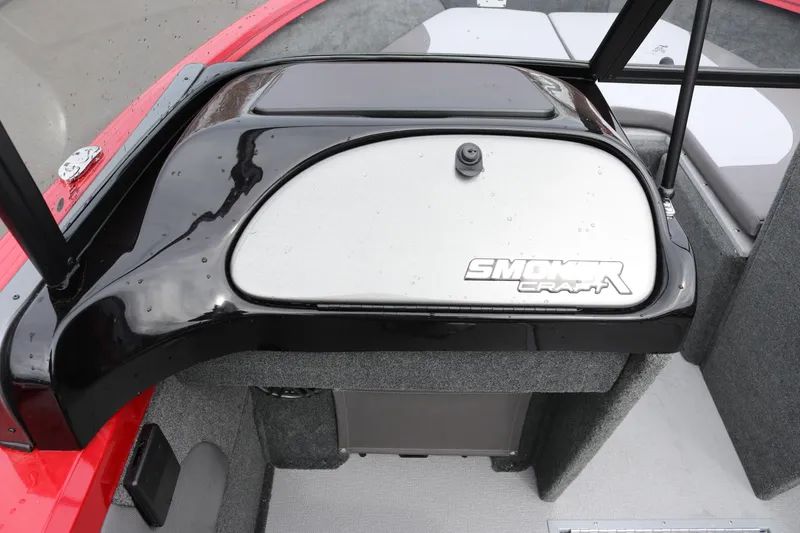 Slide: The Image of 2026 Smoker Craft Ultima 182 boat dashboard with sleek black and gray design. - 19