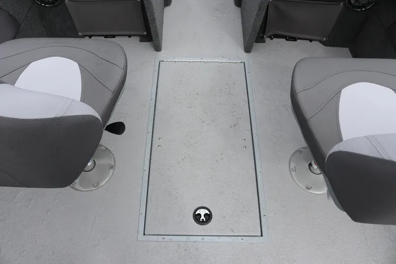 Slide: The Image of Interior of 2026 Smoker Craft Ultima 182 boat with gray seating and floor hatch. - 23
