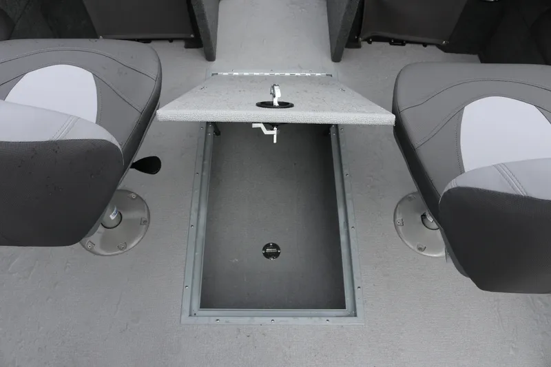 Slide: The Image of Interior view of 2026 Smoker Craft Ultima 182 boat with seating and storage compartment. - 24