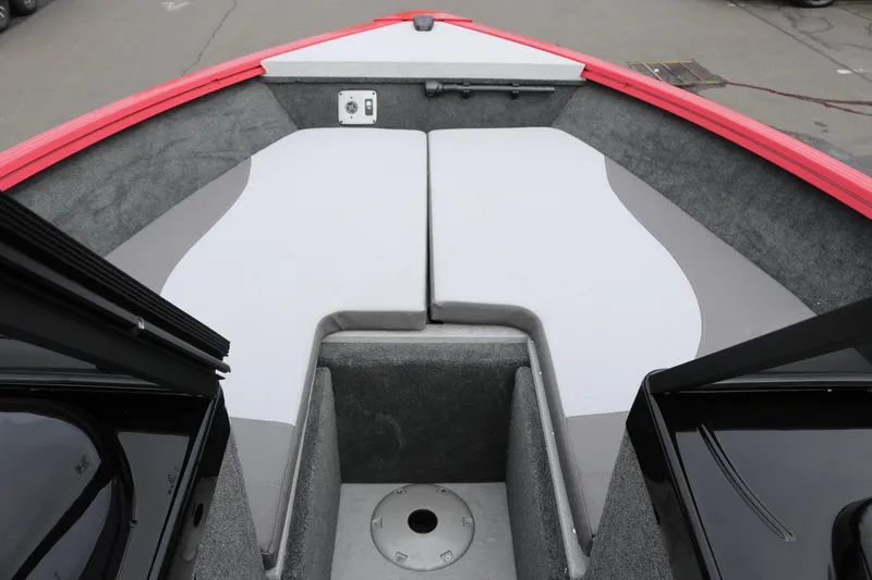 Slide: The Image of Interior view of 2026 Smoker Craft Ultima 182 boat with cushioned seating. - 25