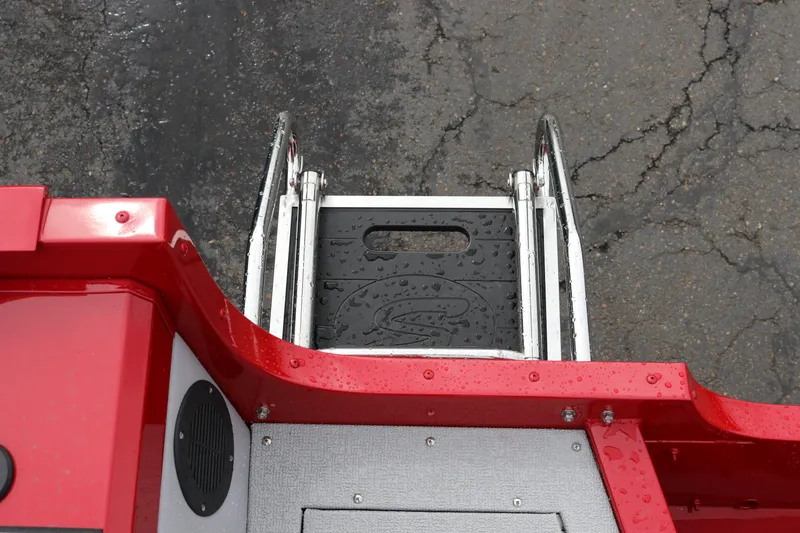 Slide: The Image of Red Smoker Craft Ultima 182 boat ladder, 2026 model, with wet surface details. - 29