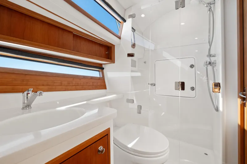 Slide: The Image of Luxurious bathroom in 2026 MJM 47 R yacht with modern fixtures and wooden accents. - 20