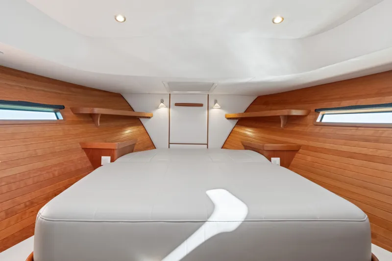 Slide: The Image of Luxurious cabin interior of 2026 MJM 47 R yacht with wooden accents and modern lighting. - 24