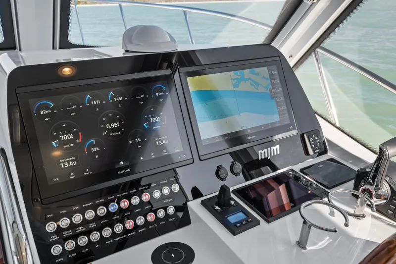 Slide: The Image of Helm of 2026 MJM 47 R yacht with advanced navigation displays. - 8