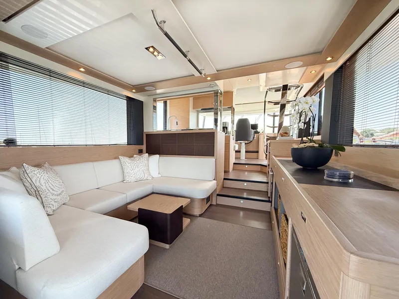 Slide: The Image of Luxurious interior of 2026 Beneteau Swift Trawler 54 with modern seating and elegant decor. - 5