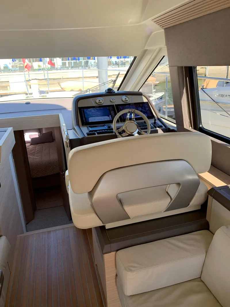 Slide: The Image of Interior of a 2016 Beneteau Monte Carlo 5 yacht with helm station. - 17