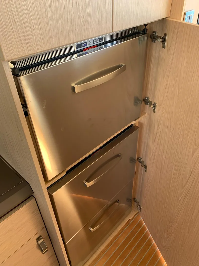 Slide: The Image of Stainless steel fridge in 2016 Beneteau Monte Carlo 5 yacht. - 23