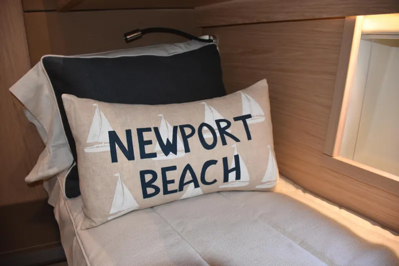 Slide: The Image of Cushion with "Newport Beach" on Beneteau Monte Carlo 5, 2016. - 31