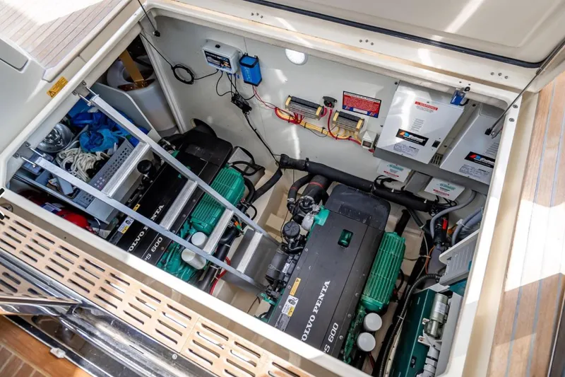 Slide: The Image of Engine room of 2016 Beneteau Monte Carlo 5 with Volvo Penta engines and electrical systems. - 44