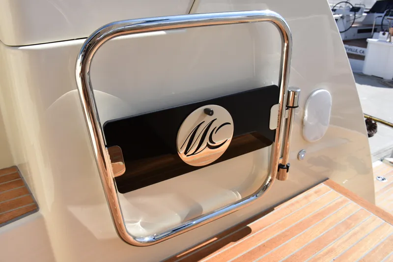 Slide: The Image of Beneteau Monte Carlo 5, 2016, yacht stern detail with logo. - 7