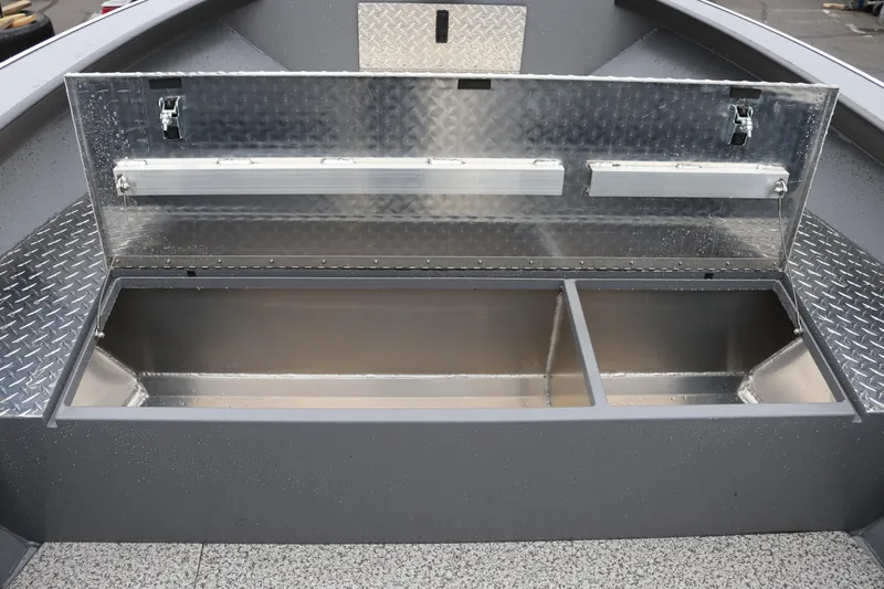 Slide: The Image of Open storage compartment in 2026 Alumaweld Super Vee Pro 23 boat. - 13