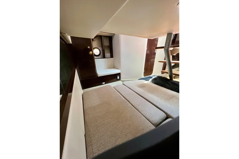 Slide: The Image of Interior cabin of 2017 Sea Ray Sundancer 350 Coupe with cozy seating and modern design. - 118