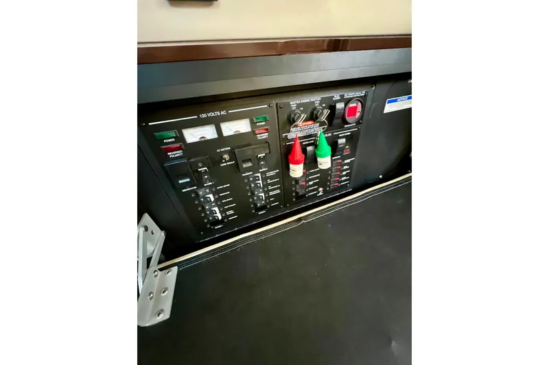 Slide: The Image of Electrical control panel on a 2017 Sea Ray Sundancer 350 Coupe boat. - 125