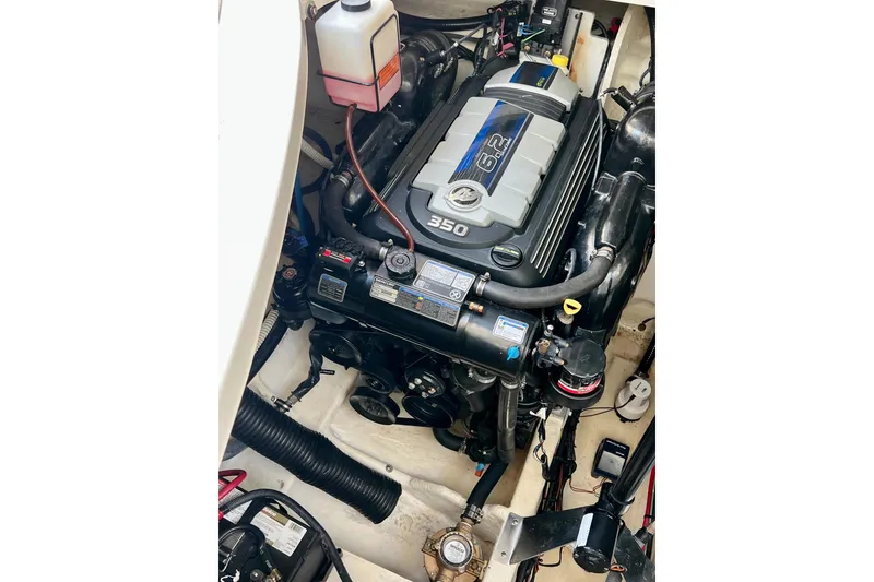 Slide: The Image of Engine compartment of 2017 Sea Ray Sundancer 350 Coupe, featuring a 6.2L engine. - 130
