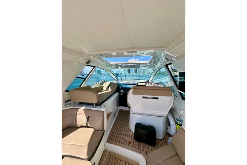 Slide: The Image of Interior of 2017 Sea Ray Sundancer 350 Coupe with luxurious seating and panoramic windows. - 28