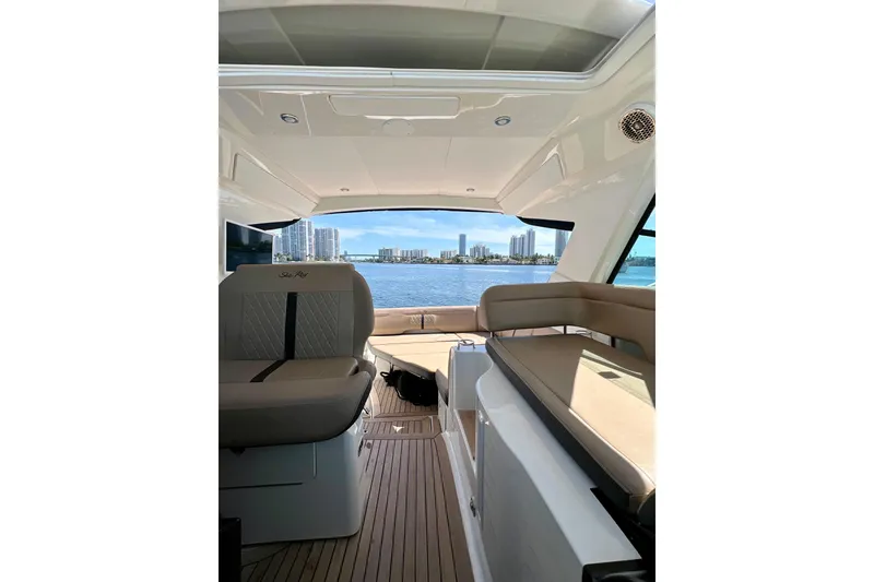 Slide: The Image of Interior view of 2017 Sea Ray Sundancer 350 Coupe with waterfront cityscape. - 46